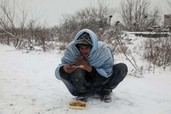 migranti foto numero 2